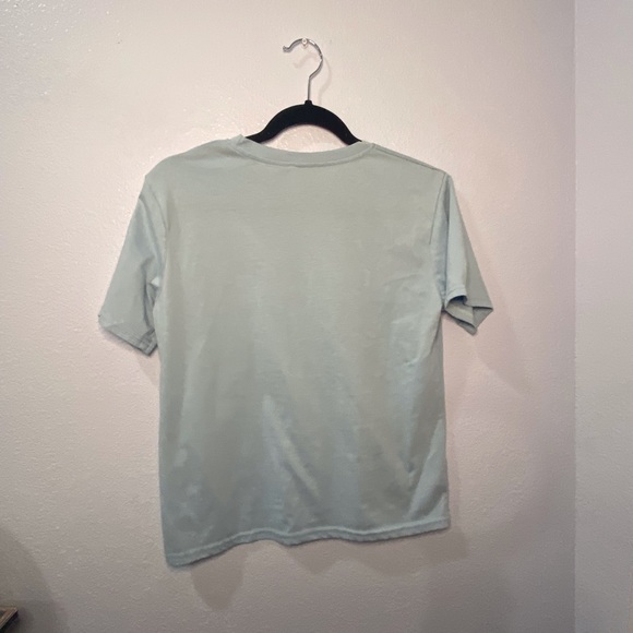 Cotton light blue shirt with wave design on front. - Picture 3 of 3